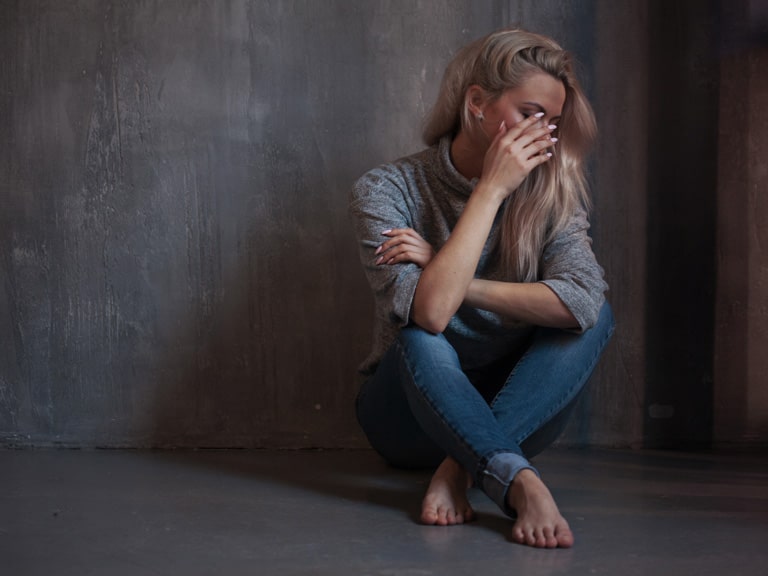Online Eating Disorder Treatment Therapist California Woman Sitting Sad