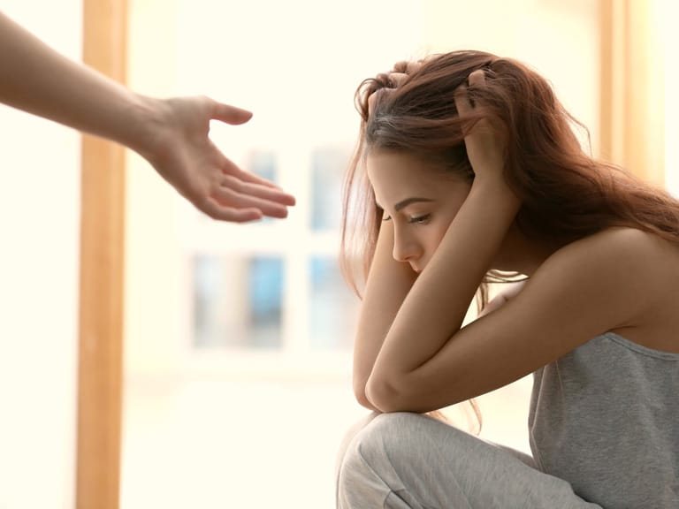 Therapist for Depression San Diego, CA Women Receiving a Helping Hand